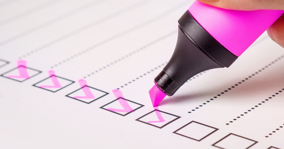 Pink highlighter completing a checklist